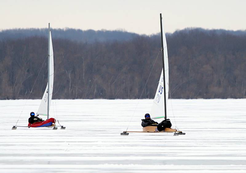 Ice boat drivers race their boats on Senachwine Lake on Thursday Jan. 27, 2022 near Putnam.