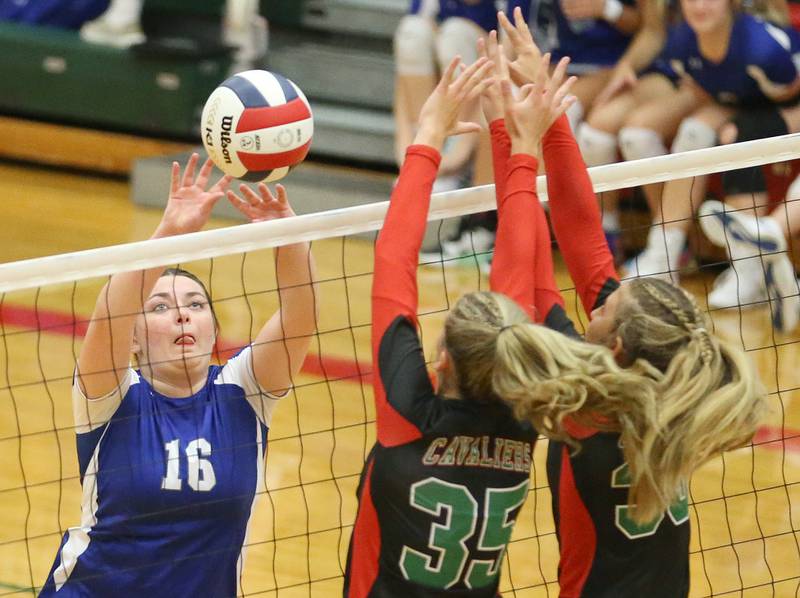 Princeton's Mariska Mount sends the ball past L-P's Aubrey Duttlinger and teammate Kelsey Fredrick on Tuesday, Aug. 22, 2023 in Sellett Gymnasium.
