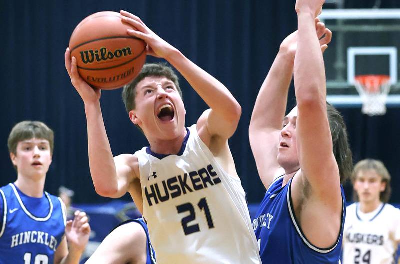 Serena's Braxton Hart shoots over Hinckley-Big Rock's Martin Ledbetter Friday, Feb. 3, 2023, during the championship game of the Little 10 Conference Basketball Tournament at Somonauk High School.