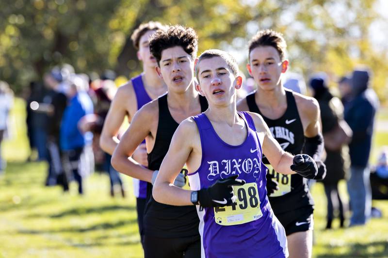 Dixon’s Aaron Conderman leads a group early in the race during the Big Northern Conference cross country race at Sauk Valley College Saturday, Oct. 15, 2022. Conderman went on to a fourth place finish.