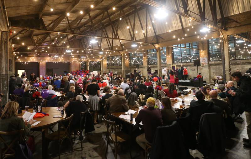 Attendees watch the crowning of the "Queen of the Arts" during the 9th annual NCI Artworks Mad Hatter Ball on Friday, Jan. 16, 2026 at the Westclox Event Center in Peru.