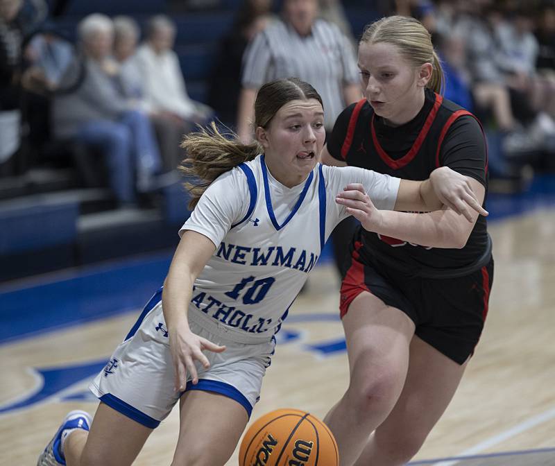 Newman’s Elaina Allen works against Stillman Valley’s Alyvia Bagg Monday, Feb. 2, 2026.