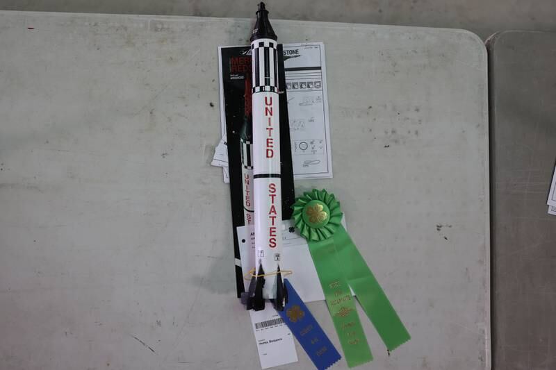 A rocket sits on display with its winning ribbon after a youth project judging competition at the Grundy County 4-H Fair on Sunday, July 30 in Morris.
