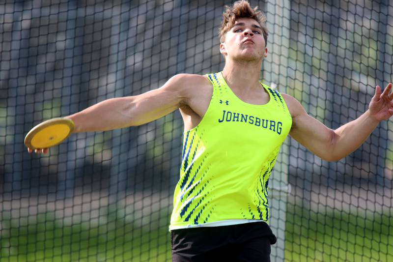 Brett Centnarowicz of Johnsburg throws the discus during Kishwaukee River Conference track meet action at Marengo Tuesday night.