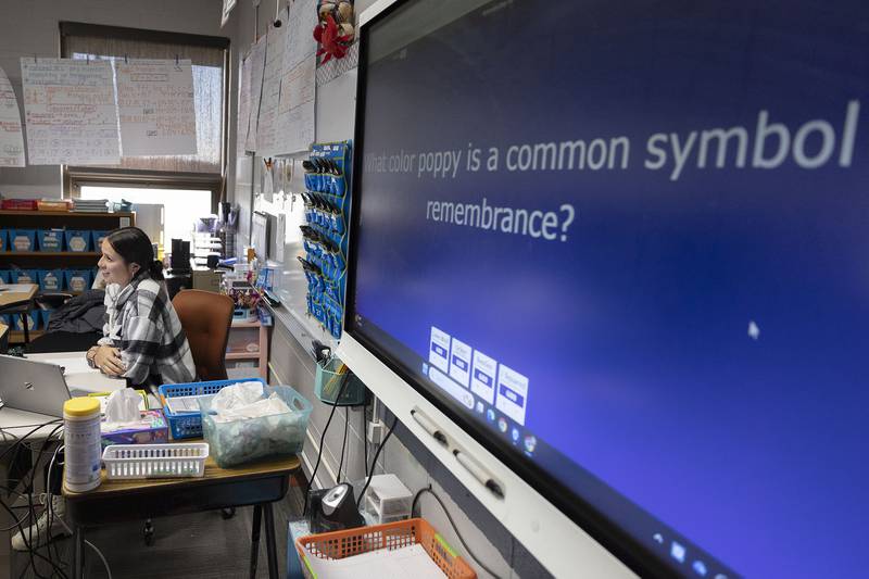 East Coloma-Nelson math teacher Taylor Grenoble displays a trivia question for her students Thursday, Nov. 13, 2025.
