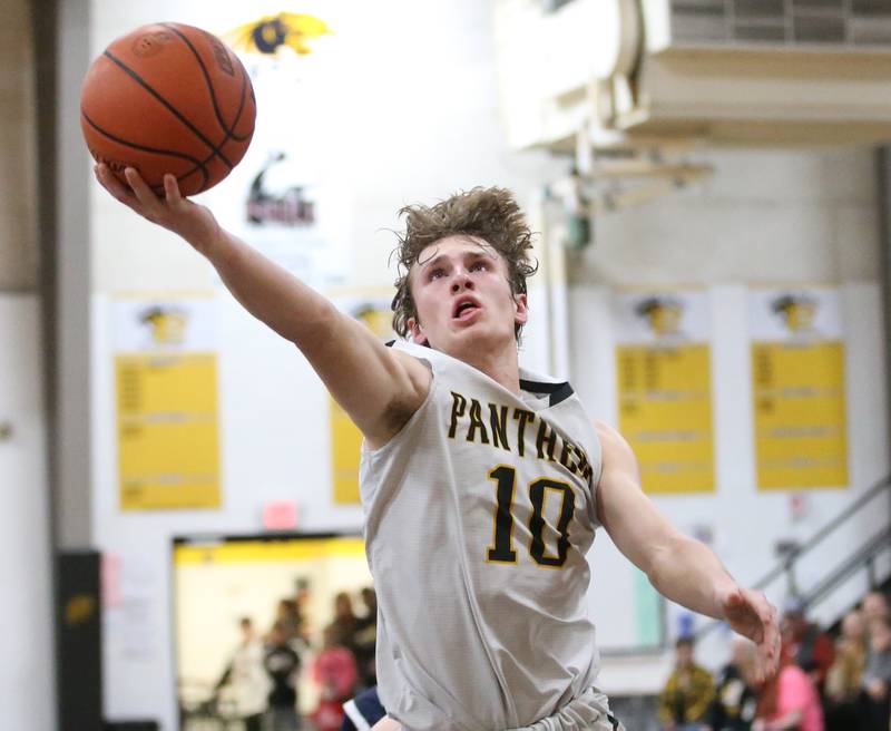 Putnam County's Austin Mattingly runs into the lane to score on a layup against Fieldcrest on Tuesday, Feb. 7, 2023 at Putnam County High School.