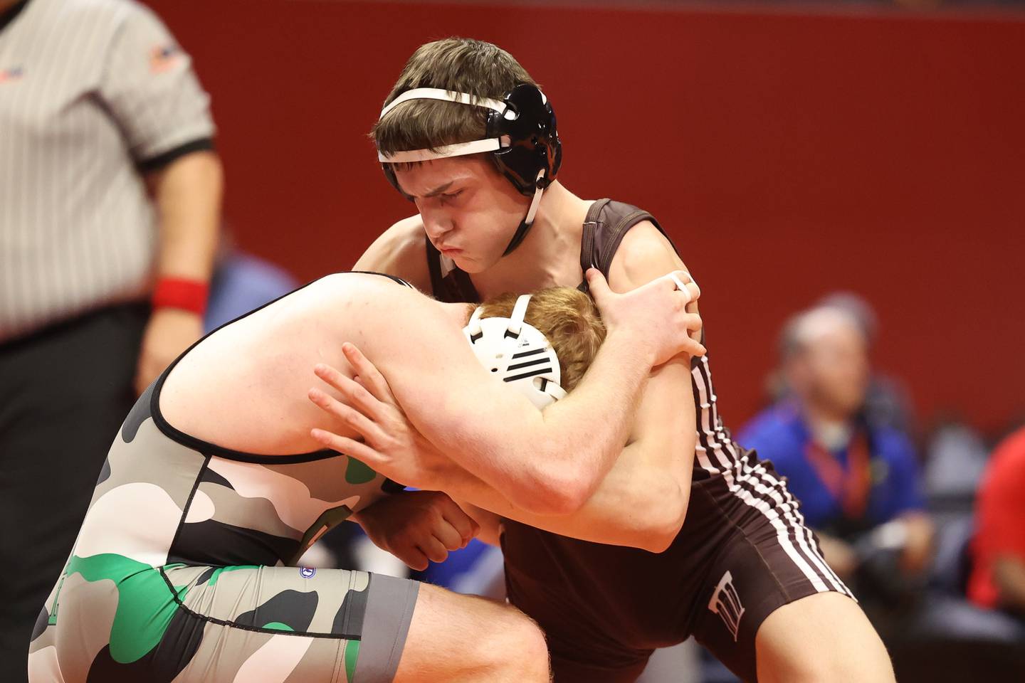 Joliet Catholic’s Nico Ronchetti works over Grays Lake Central’s Matty Jens in the 182-pound Class 2A championship match on Saturday, Feb. 18, 2023 at State Farm Center in Champaign.