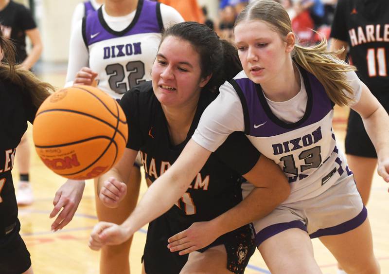 Dixon's Sophia Wendt (13) and Harlem's Melia Collette (31) reach for the ball at the Oregon Girls Tip-Off Tournament on Wednesday, Nov. 19, 2025 at the Blackhawk Center in Oregon.