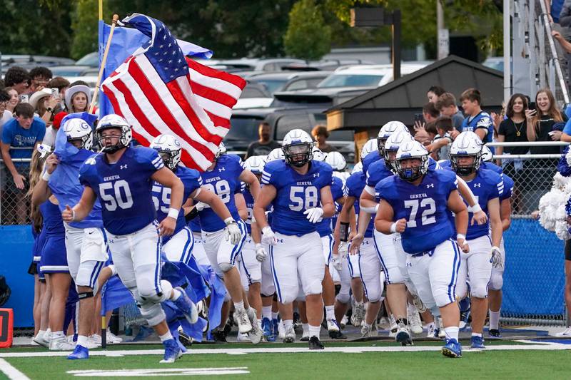 Geneva takes the field prior to the start of their football game against Larkin at Geneva High School on Friday, Aug 30, 2024.