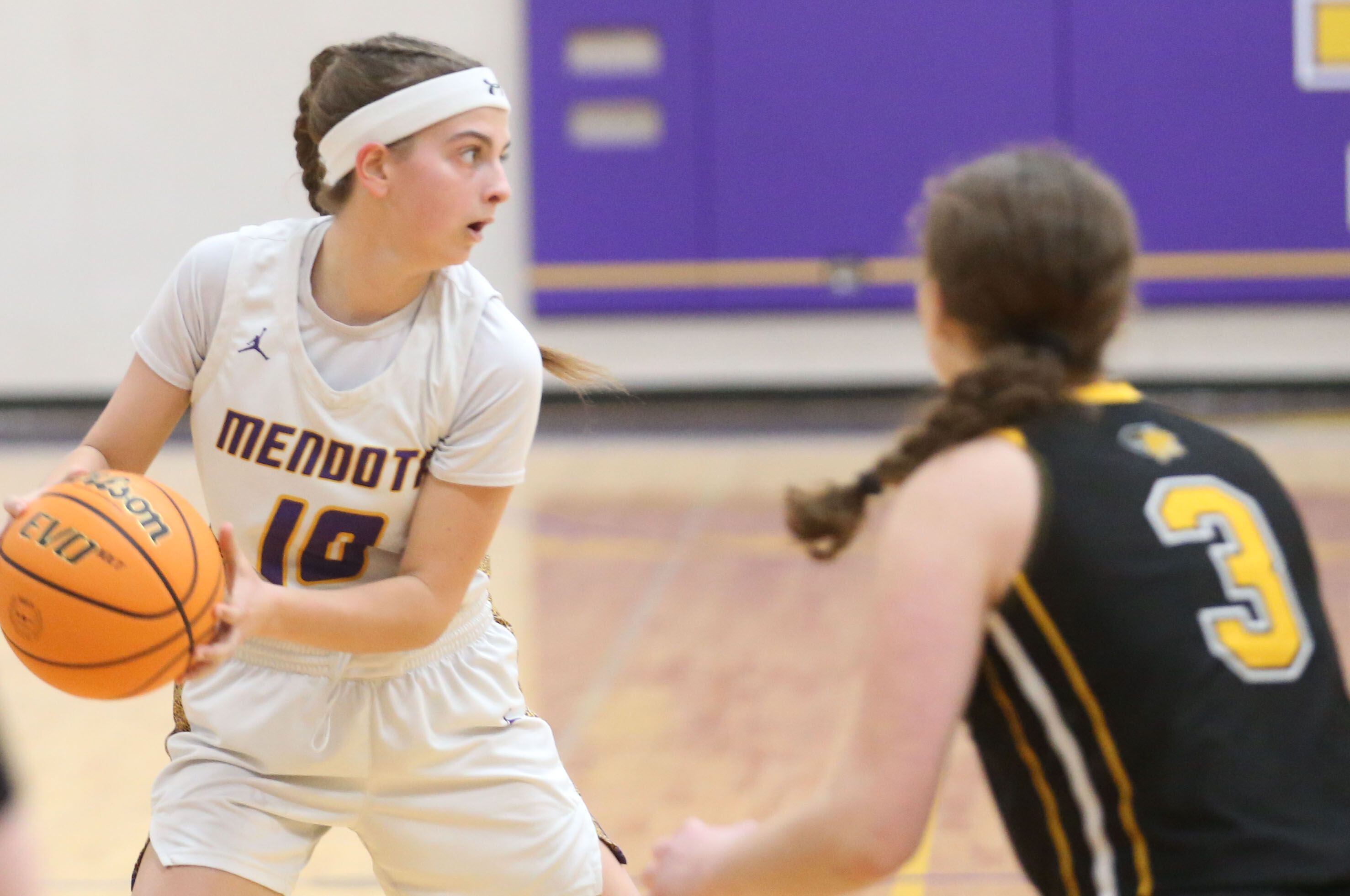 Mendota's Brooklyn Baxa looks to pass the ball around Putnam County's Sofia Borri on Tuesday, Feb. 10, 2026 at Mendota High School.