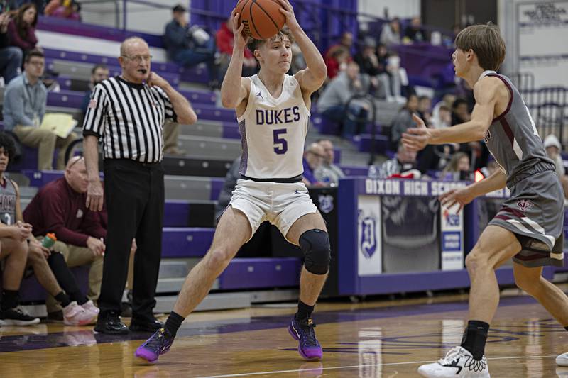 Dixon’s Grant Boss looks to pass Tuesday, Dec. 20, 2022 against IVC.