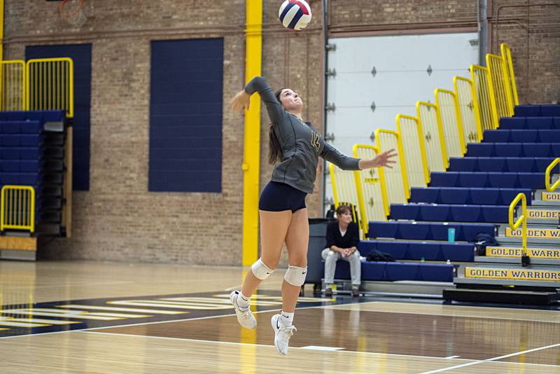 Sterling’s Maggie Rowzee makes a serve Monday, Sept. 26, 2022 against Washington.
