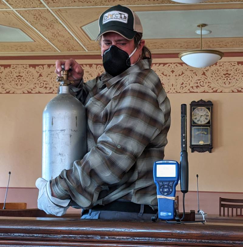 Tim Benedict of the Blackhawk Hills Regional Council does air testing at the Ogle County Courthouse in Oregon. Photo supplied.