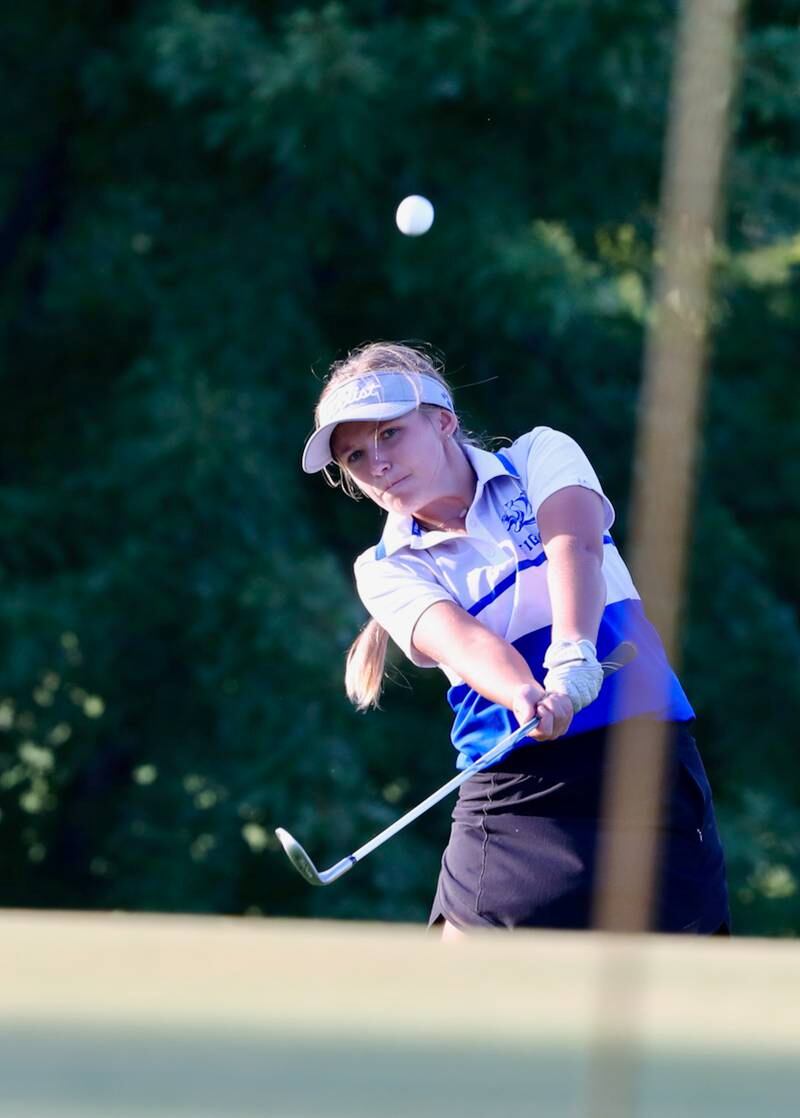 Princeton's Addie Hecht chips on to the green during Thursday's meet at Wyaton Hills.