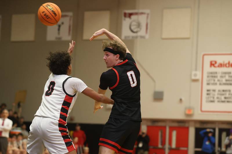 Bolingbrook’s Trey Brost makes a overhead pass against Benet in the Class 4A Bolingbrook Sectional championship game on Friday, March 6, 2026 in Bolingbrook.