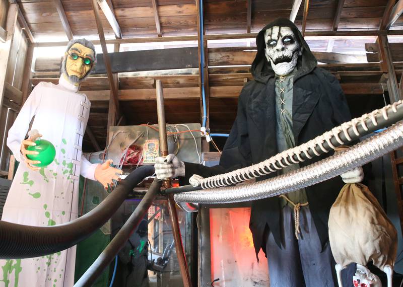 Tall animatronic figures greet visitors to the Nightmare on Fairgrounds Road Haunted Attraction on Wednesday, Sept. 25, 2024 at the Bureau County Fairgrounds in Princeton.