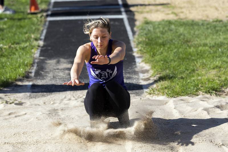 Dixon’s Izzy Queckboerner lands her triple jump Thursday, May 8, 2025, during the girls Big Northern Conference track meet.