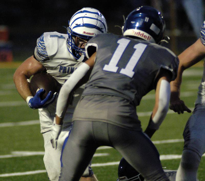 Tiger's Casey Etheridge faces off against Newman's Parker Strommen. Newman Central Catholic H.S hosted Princeton H.S. in a non-conference football game at Sterling H.S, on Friday, August 29, 2025.