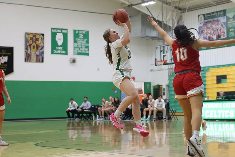 Providence’s Gabi Bednar puts up a shot against Mother McAuley on Monday, Jan. 8th, 2024 in New Lenox.