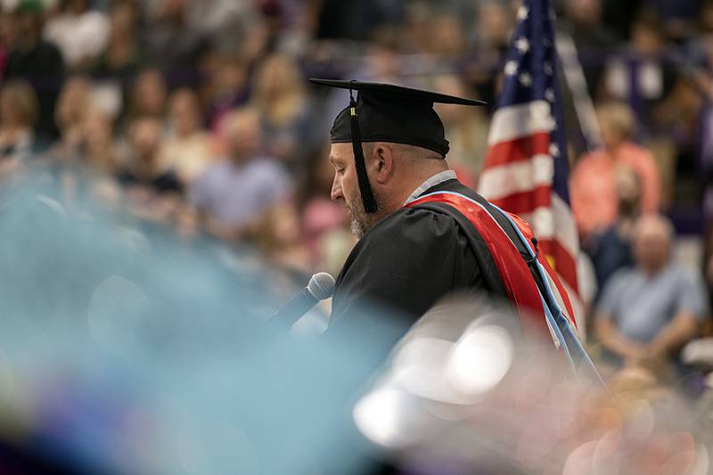 Dixon principal Jared Shaner reminds students to work hard and be kind as they go forward Sunday, May 26, 2024 during commencement.