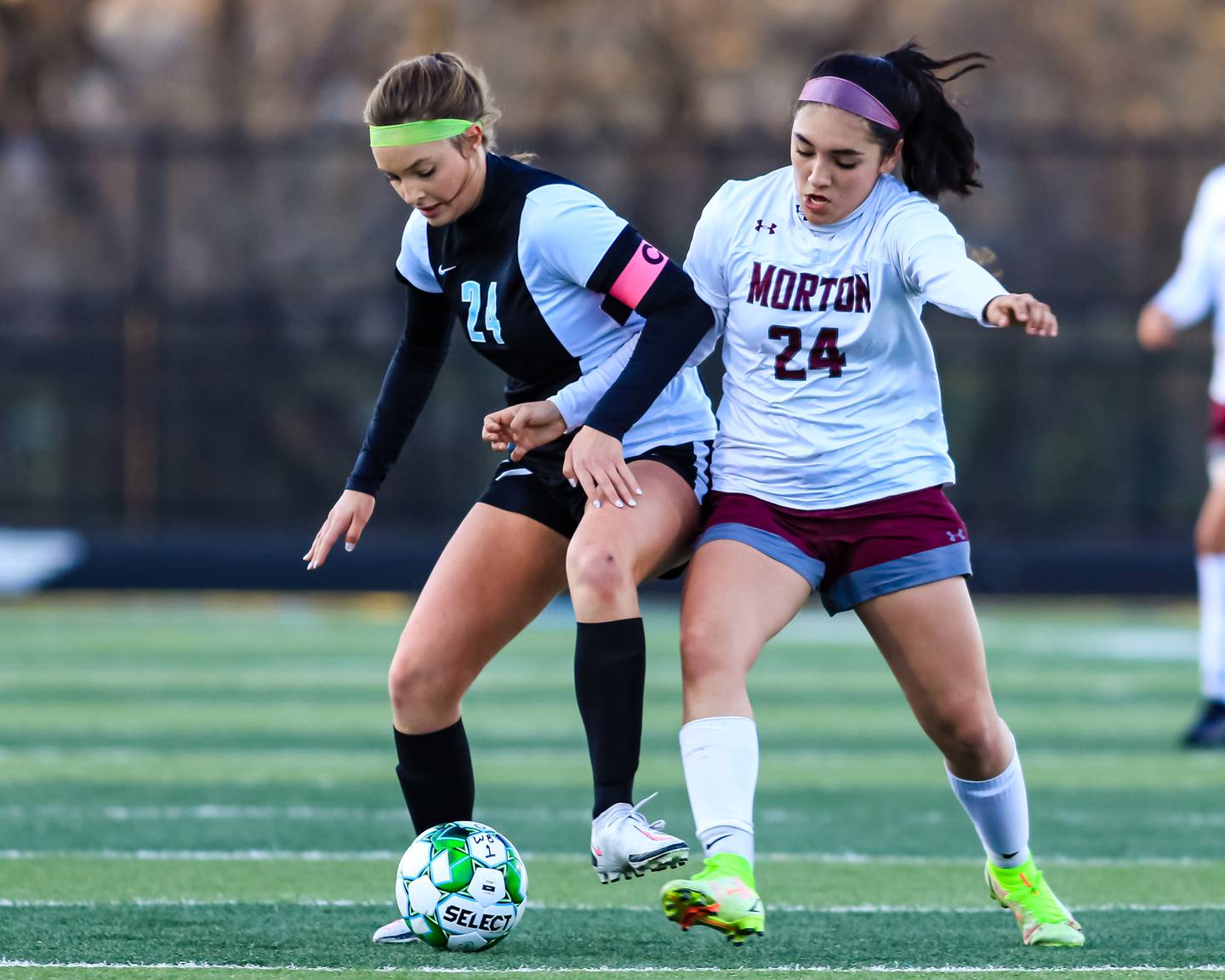 Willowbrook's Izzy Manning (24) battles for the ball during soccer match between Morton at Willowbrook. April 14, 2022.