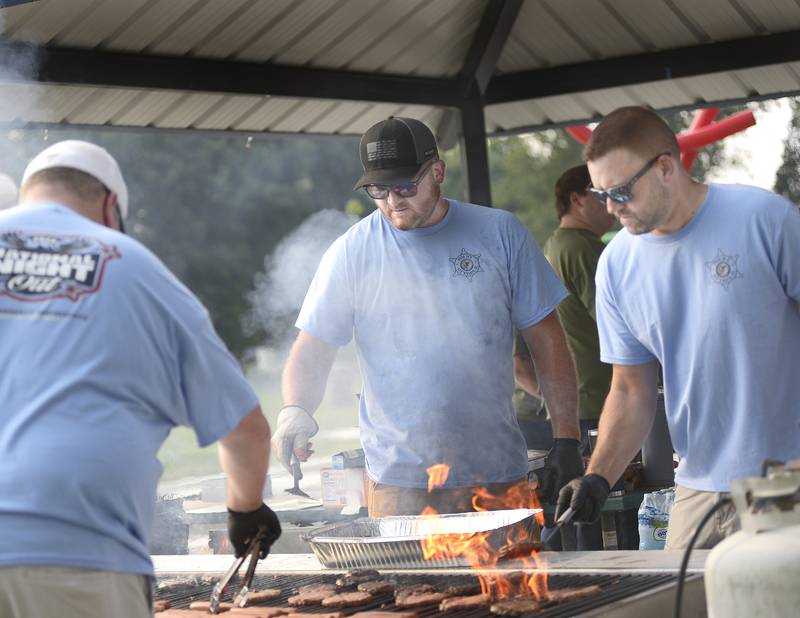 The Ottawa Police Dept. were busy manning the grills cooking hot dogs and hamburgers for those with an appetite Tuesday evening at Peck Park in Ottawa during National Night Out.