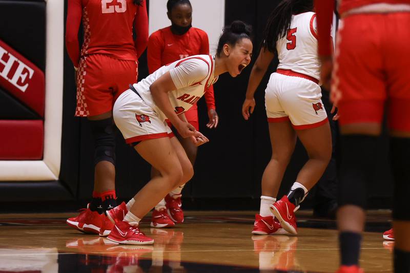 Bolingbrook’s Angelina Smith celebrates a basket and the foul against Homewood-Flossmoor in the Class 4A Bolingbrook Sectional championship. Thursday, Feb. 24, 2022, in Bolingbrook.