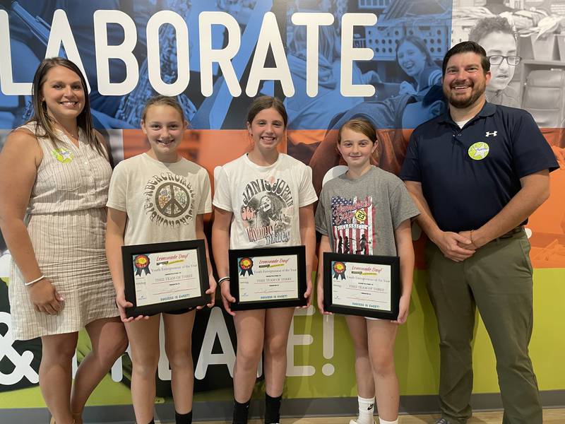 The 2023 Youth Entrepreneurs of the Year are pictured with Rachel Balestri, of Eureka Savings Bank; (left to right) Kenlee Heider, Quinn Krug, Preslee Harmon (making up Thee Team of Three) and Bill Zens, Illinois Valley Area Chamber of Commerce executive director.
