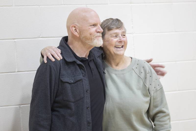 Don Wood, Deb Mortonson's first maintenance man at the Sterling/Rock Falls YMCA, has a picture taken Wednesday, Dec. 17, 2025, with the retiring instructor. “She’s the most selfless person I’ve ever met,” Wood said. “She exemplifies what the Y is all about.”
