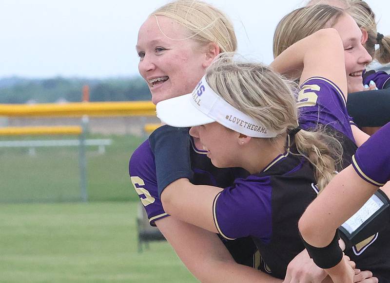Serena pitcher Cassie Walsh reacts with teammate Maddie Young after defeating Marquette during the Class 1A Regional title game on Friday, May 22, 2026 at Serena High School.