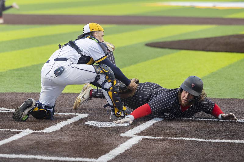 Sterling’s Miles Nawrocki tags out Hall's Joel Koch at the plate Wednesday, April 17, 2024 at Gartner Park in Sterling.