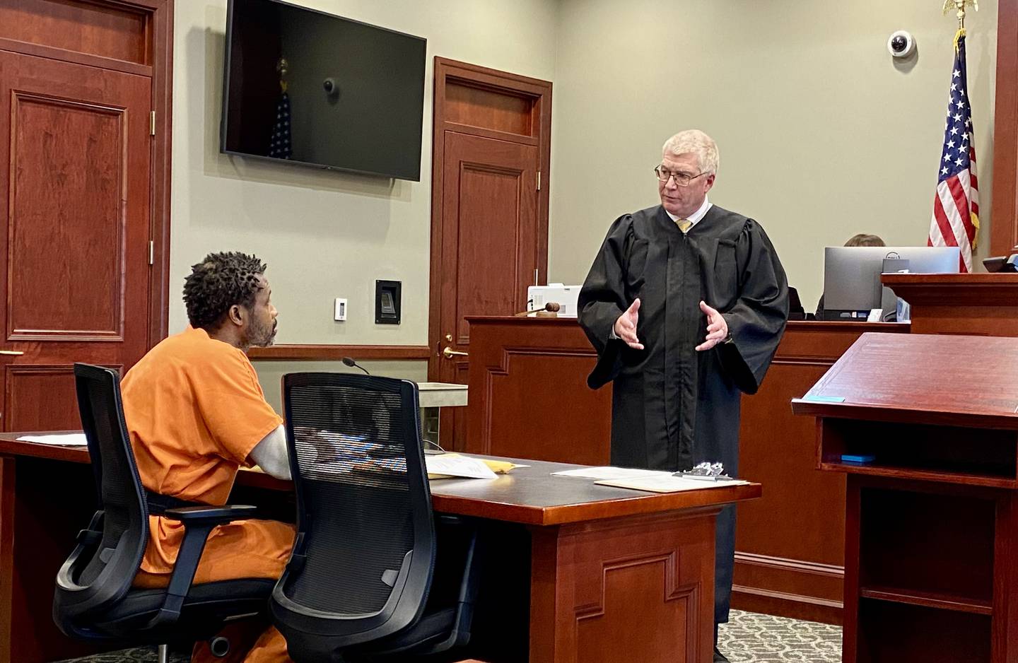 Matthew L. Martin (left) listens as DeKalb County Circuit Court Judge Philip Montgomery explains how jury instruction will work in a pretrial hearing on Wednesday, April 2, 2025, at the DeKalb County Courthouse in Sycamore. Martin, 44, of Chicago, is charged in a July 2024 DeKalb bank robbery and is expected to represent himself at trial beginning April 7.