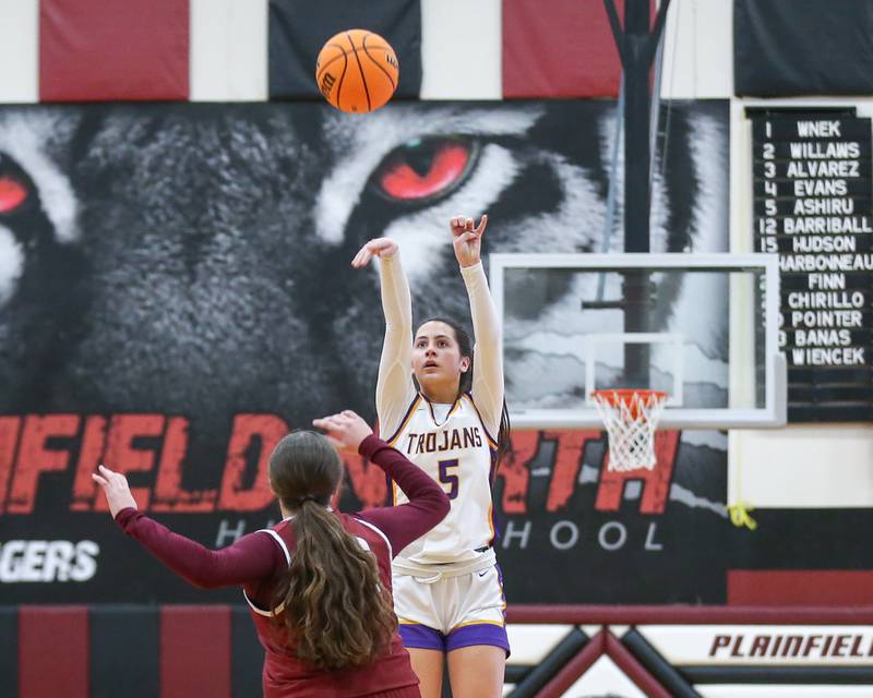 Downers Grove North's Campbell Thulin (5) shoots a jumper during their Regional Final basketball game between Downers Grove North at Plainfield North. Feb 20, 2025 in Plainfield.