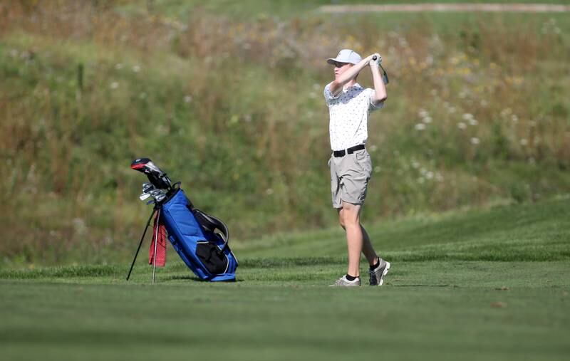 St. Charles North’s Jack Spotts hits from the fairway during the Class 3A Plainfield North Boys Golf Sectional at Whitetail Ridge Golf Course in Yorkville on Monday, Oct. 2, 2023.