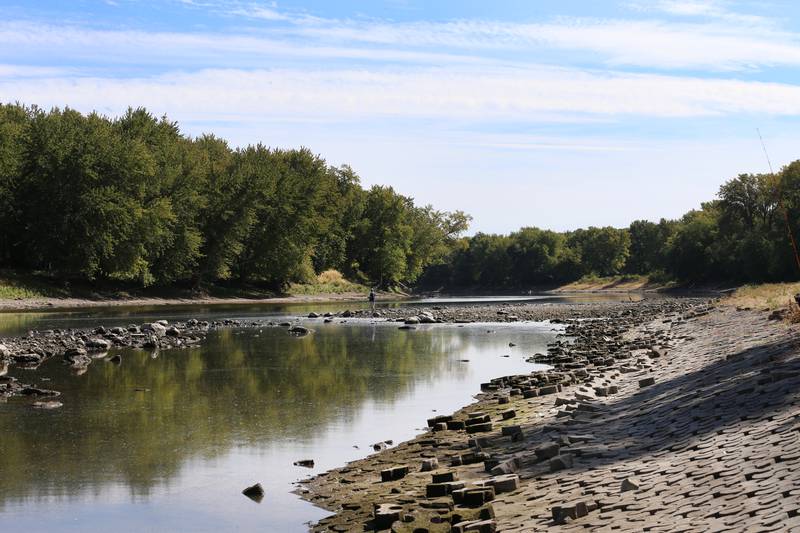 Jim Small of Lemont, fishes in the center of the channel at Plum Island on Wednesday, Oct. 5, 2022 at Starved Rock State Park. The Illinois River is inches away from an all-time record low. The river level at the Starved Rock Lock and Dam is 440.09 feet above sea level and the record low is 439.90 set back on Oct. 3, 2012.