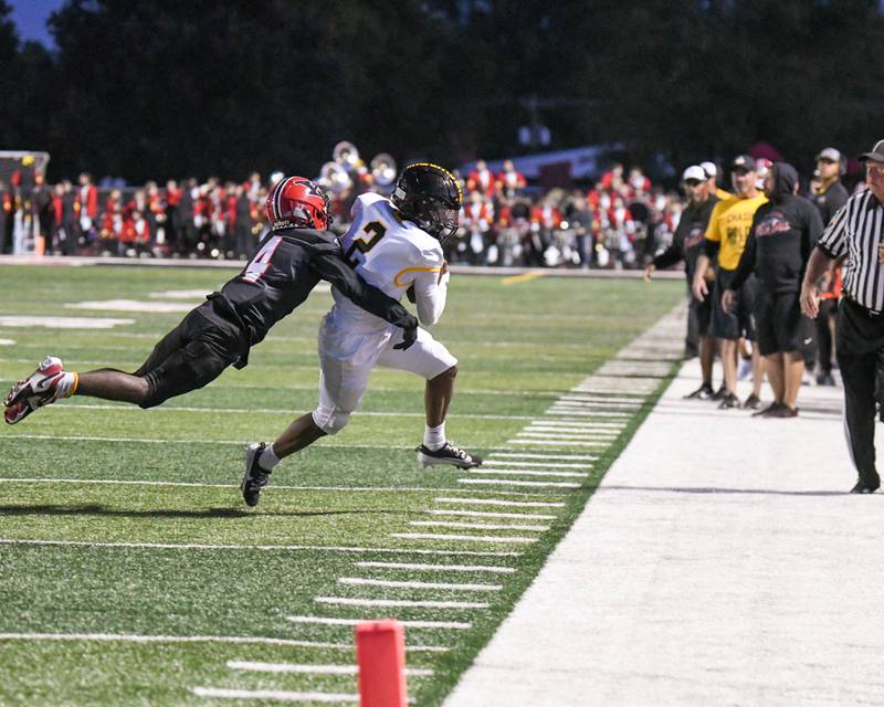 Yorkville's Jayden Ruth, left, pushes Joliet West's Landon Mars out of bounds during the game on Friday Sept. 5, 2025, held at Yorkville High School.