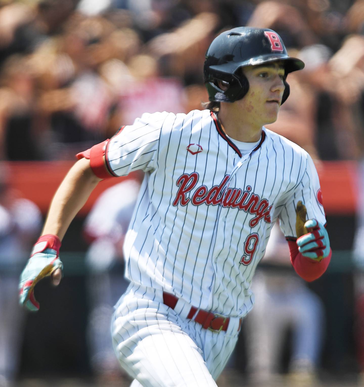 Benet Academy's Quinn Rooney watches the flight of his fourth-inning home run during the Class 3A state baseball title game against St. Laurence at Slammers Stadium on Saturday, June 14, 2025 in Joliet.