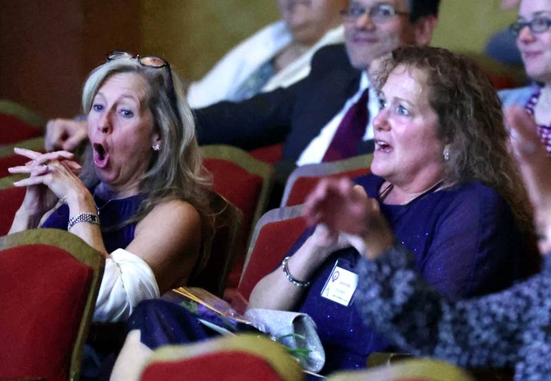 Jennifer Yochem (right) and her presenter Christine Kalina react as Yochem is announced as the 2024 Athena Award recipient Thursday, Oct. 10, 2024, during the Athena and Women of Accomplishment Awards reception hosted by the DeKalb Chamber of Commerce at the Egyptian Theatre.