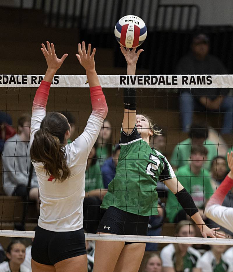 Rock Falls’ Kacie Witherow works the net against Oregon Tuesday, Oct. 24, 2023 at the Riverdale volleyball regional.