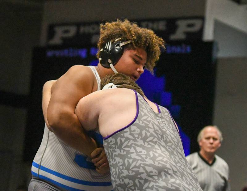 St. Francis Jaylen Torress goes head to head with Alex Diaz of Plano In the 285 weight class championship match Saturday Dec. 10t where Jaylen took the win at the Plano Reaper wrestling classic held at Plano High School.