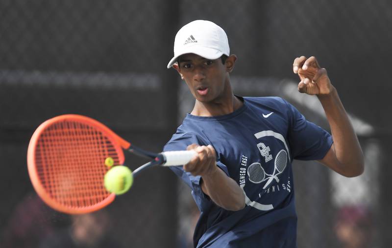 Oswego East’s Pranav Kannan returns the ball during the boys state tennis tournament at Barrington High School Thursday, May 29, 2025.