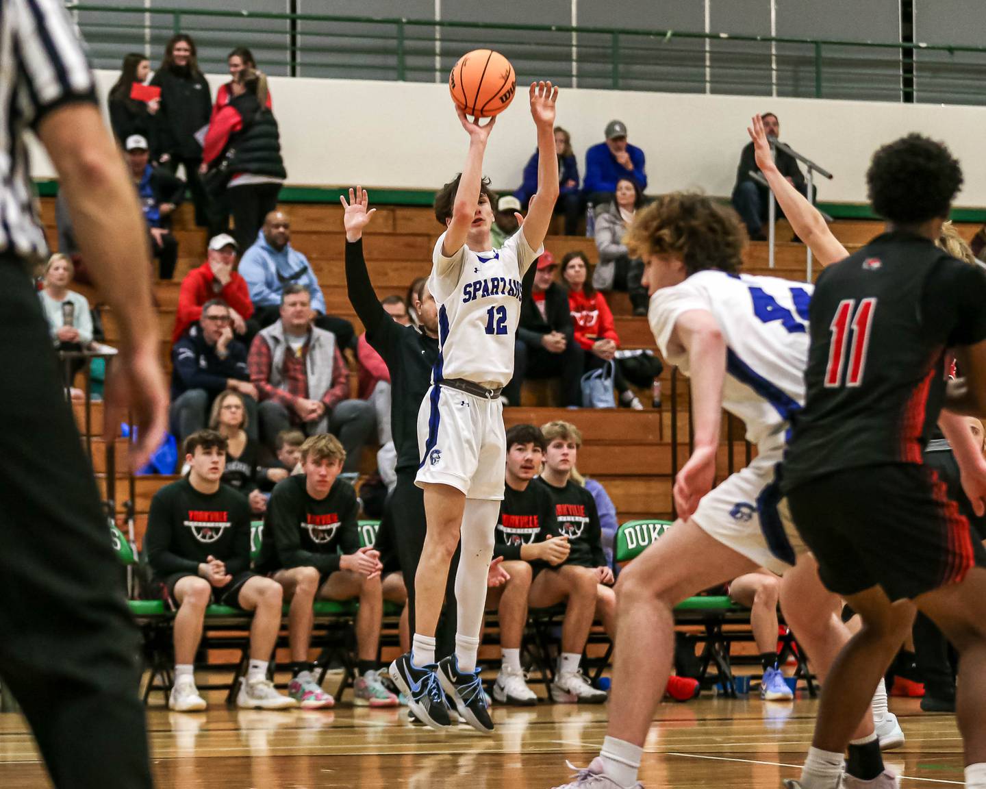 St Francis Tanner Hozian (12) shoots a jumper during their Jack Tosh Holiday Classic basketball tournament game between St Francis at Yorkville Thursday Dec 26, 2024 in Elmhurst.