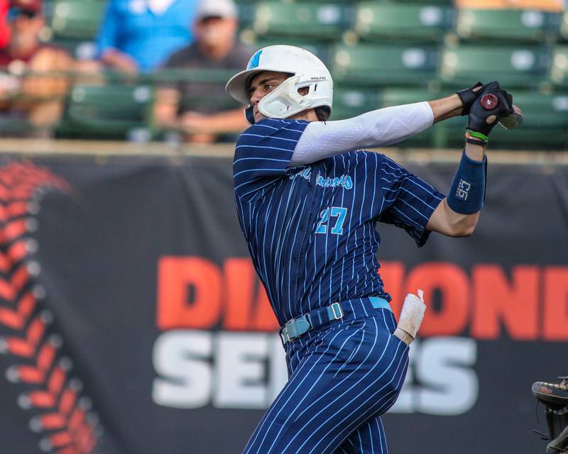 Nazareth's David Cox (27) swings at a pitch during Class 3A Crestwood Supersectional game between Lindblom at Nazareth.  June 5, 2023.