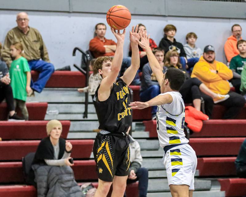 Putnam County's Austin Mattingly shoots a jump shot during varsity basketball game between Putnam County vs Yorkville Christian. Dec 21, 2022.