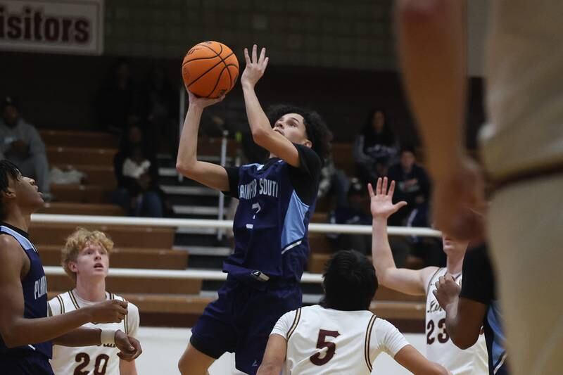 Plainfield South’s Cable Navarro puts up a shot against Morris on Wednesday, Jan 29, 2025 in Morris.