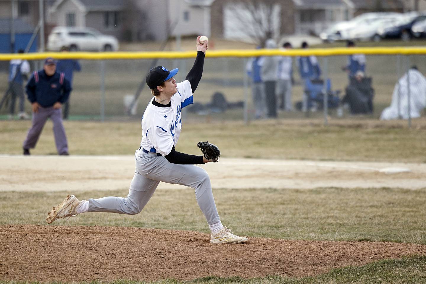 Newman’s Brendan Tunink fires a pitch against Eastland Tuesday, March 21, 2023.