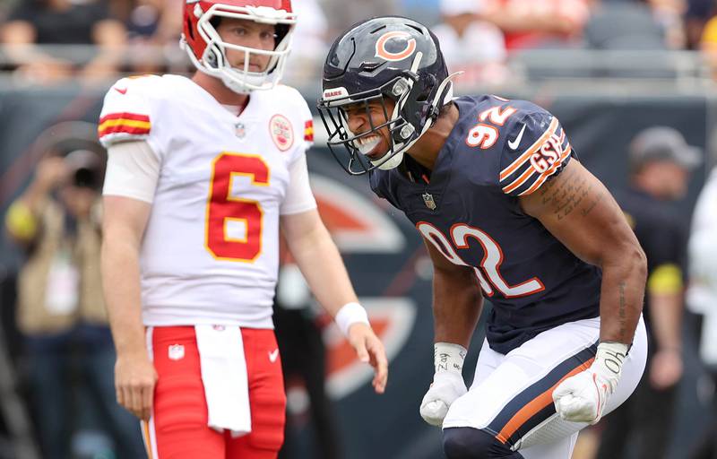 Chicago Bears linebacker Caleb Johnson celebrates a play in front of Kansas City Chiefs quarterback Shane Buechele during their preseason game Aug. 13, 2022, at Soldier Field in Chicago.