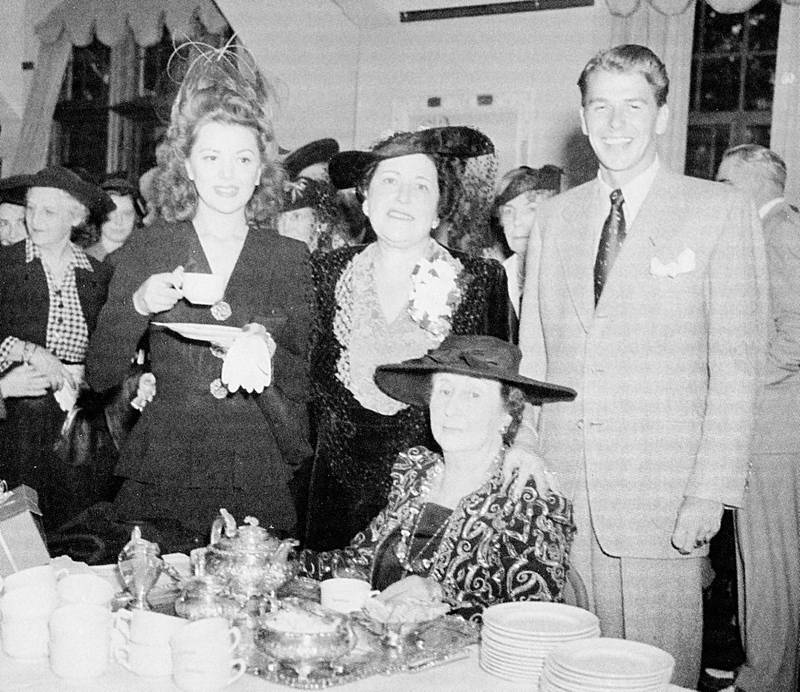 Hollywood stars Ann Rutherford (left) and Ronald Reagan (right) joined Mabel Shaw (seated), publisher of the Dixon Telegraph, for the festivities honoring Louella Parsons (center) in September 1941.