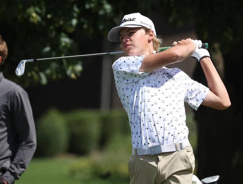 Kaneland’s Dylan Pjesky hits a tee shot Monday, Aug. 25, 2025, during the Mark Rolfing Cup at the Kishwaukee Country Club in DeKalb.