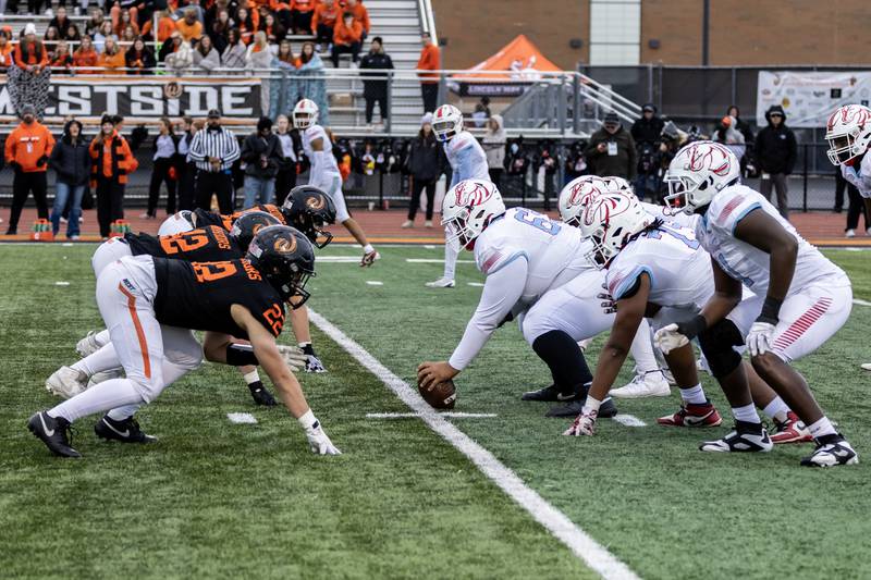 Lincoln-Way West and Kenwood face-off during a 7A varsity football playoff game at Lincoln-Way West on Nov. 8, 2025.